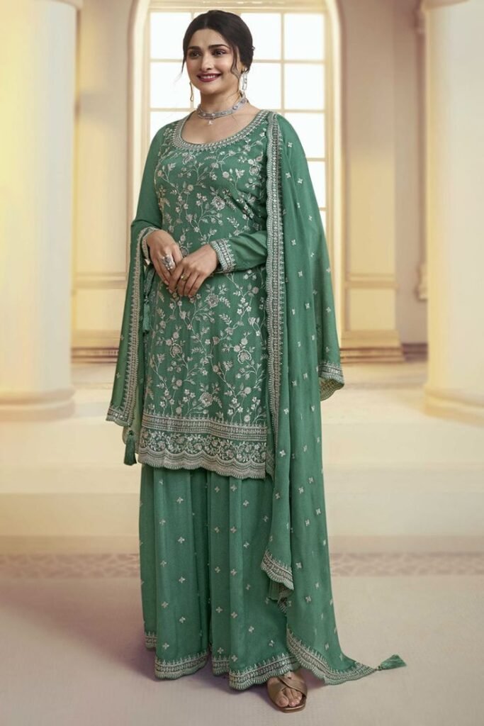 Stunning best wedding sharara in Kottakkal from Rentique, featuring detailed handwork, premium fabric, and a graceful bridal style for a perfect wedding look.